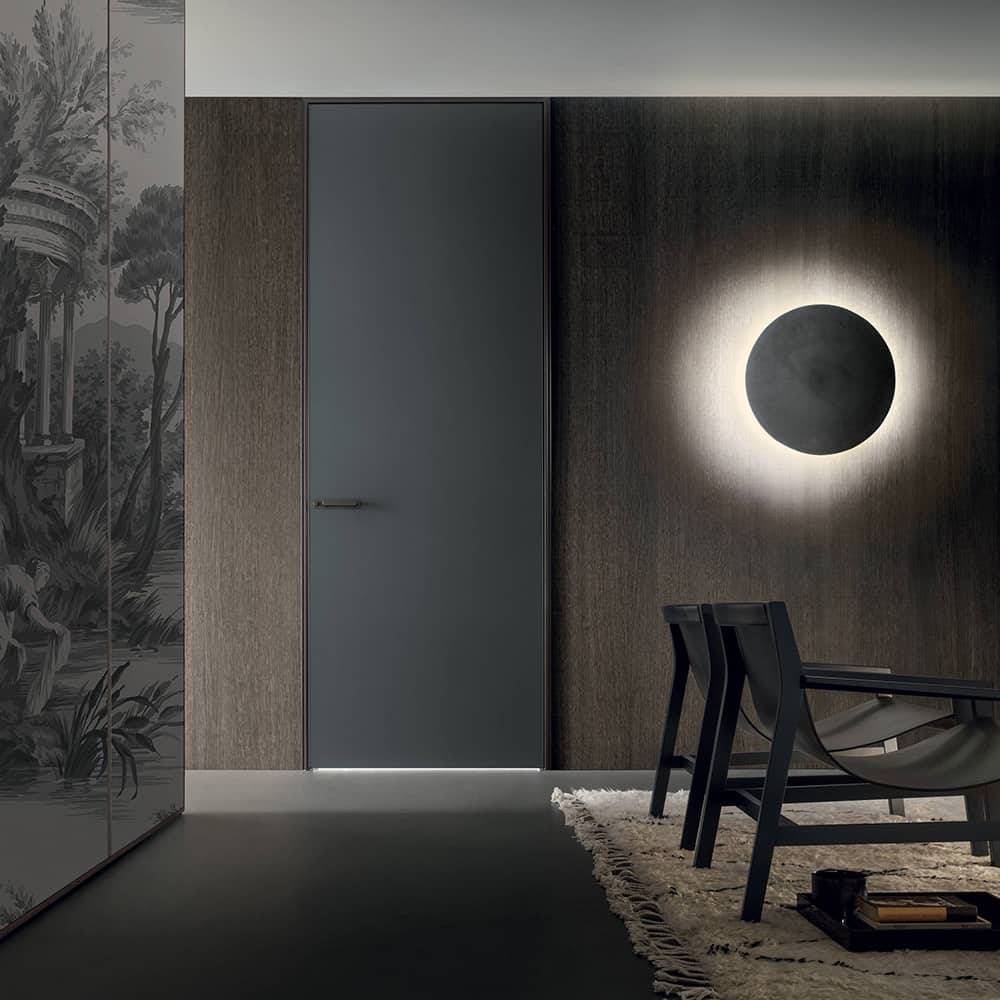 Rimadesio Link+ binnendeur met aluminium profiel en glas toegepast in een architectonisch interieur