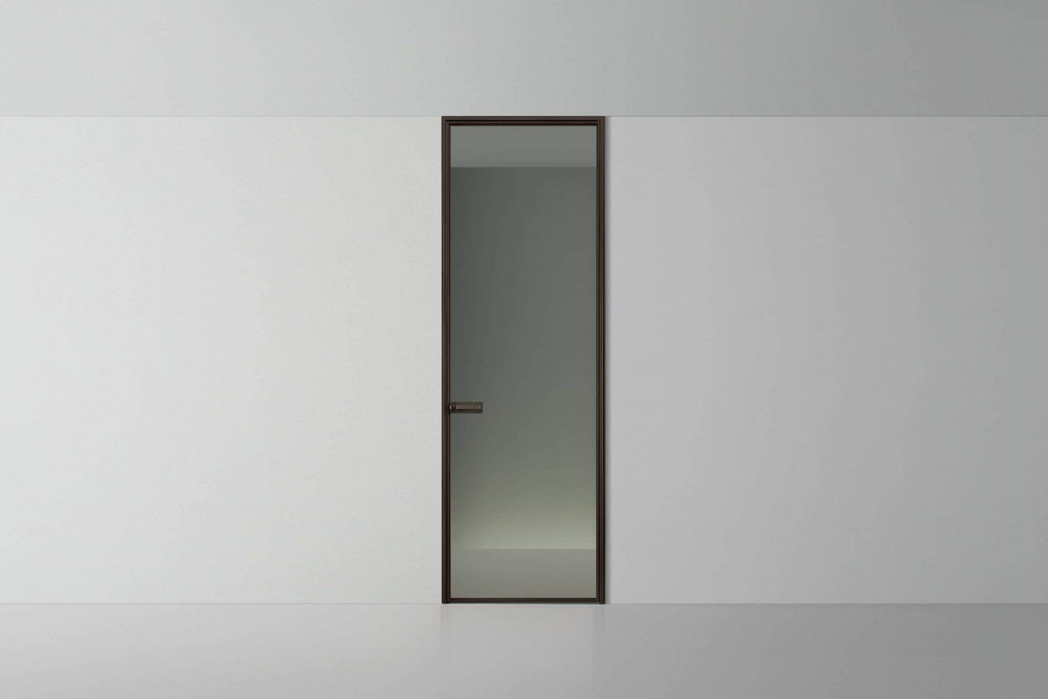 Minimalistische glazen scharnierdeur uit de Rimadesio Spin collectie