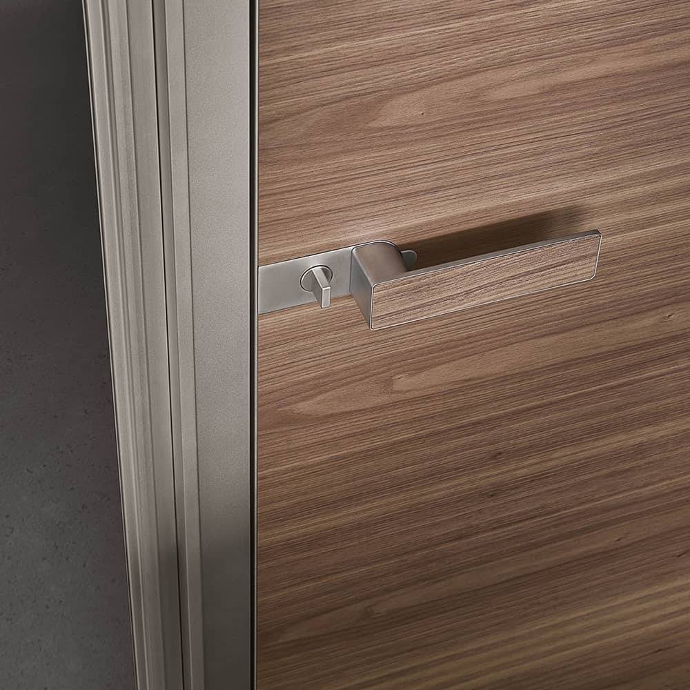 luxe binnendeur aluminium kader en notenhout op maat rimadesio moon