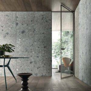 Op maat gemaakte design taatsdeuren Rimadesio Vela met strak minimalistisch ontwerp en hoogwaardige afwerking, ideaal voor moderne interieurs.
