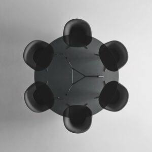 rimadesio manta ronde tafel met donker transparant glas en glanzende aluminium poten Noctum Rotterdam