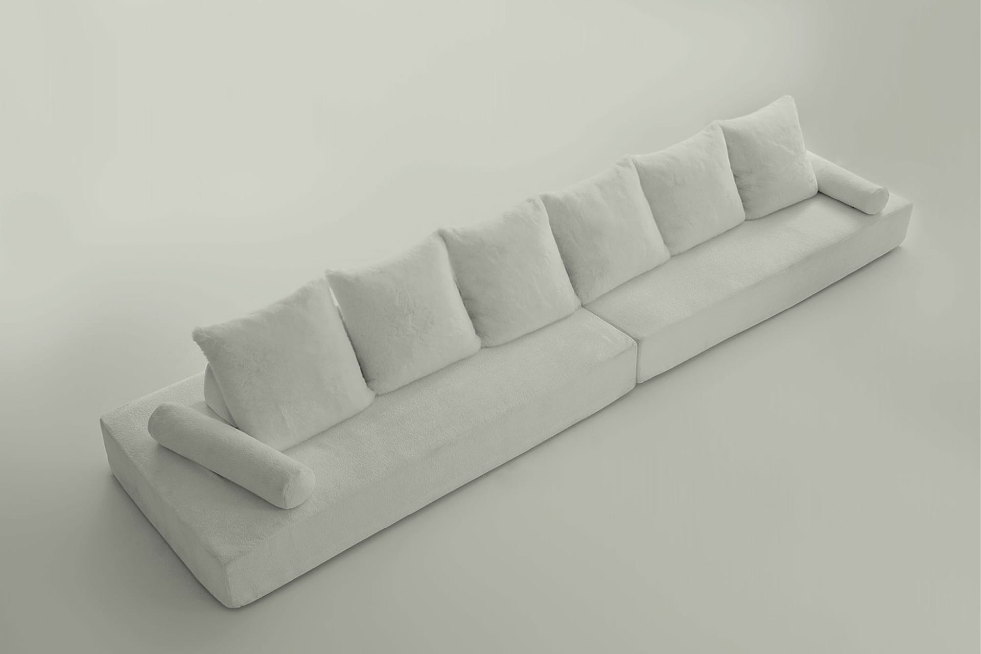 Edra Sherazade sofa, ontworpen door Francesco Binfaré, met een elegant en exclusief Italiaans design, vervaardigd uit hoogwaardige materialen zoals Gellyfoam® en donsveren, met configureerbare kussens voor ultiem comfort en veelzijdig gebruik.