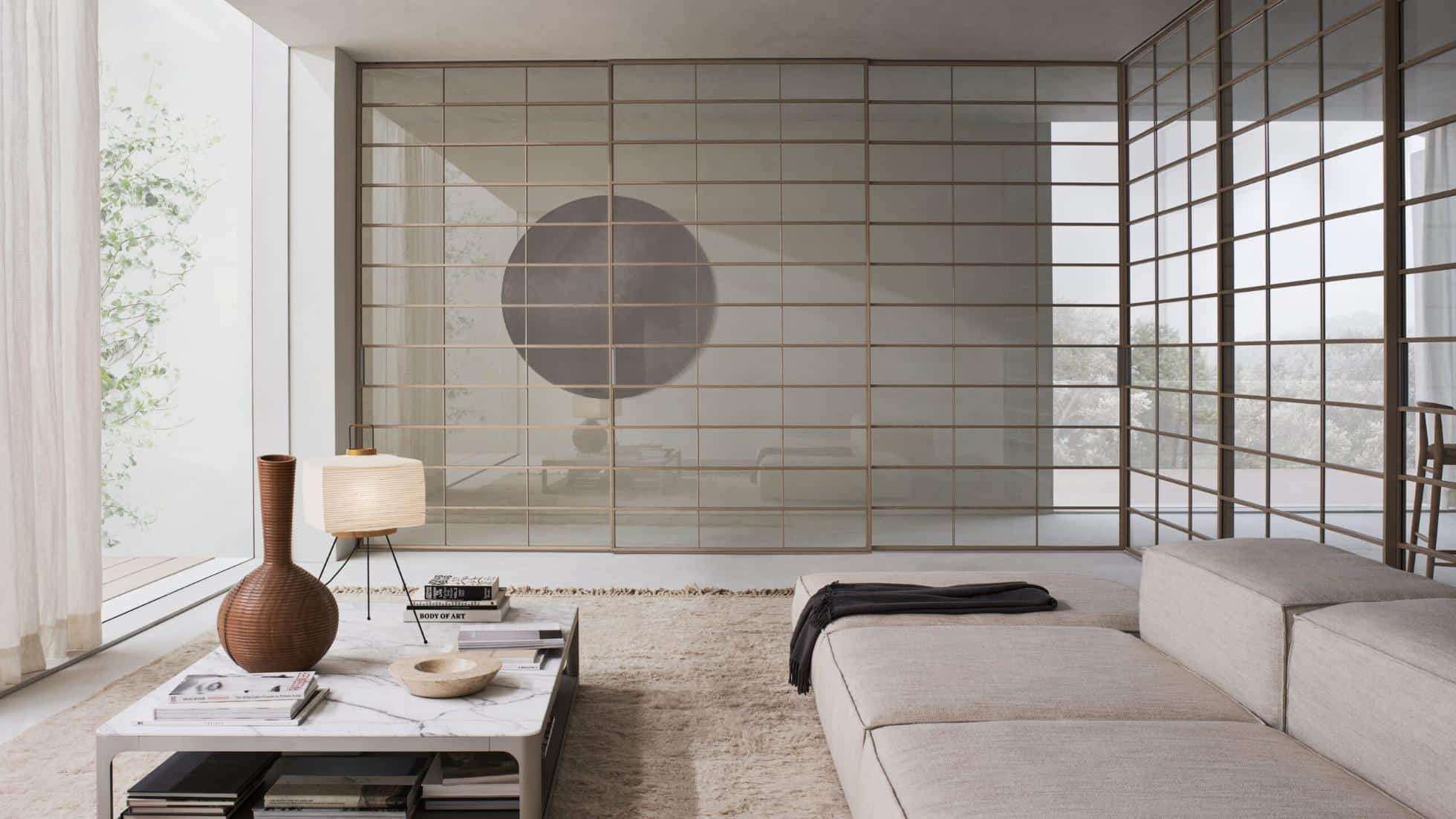 Rimadesio Soho schuifdeur met vlakverdeling in glas en aluminium toegepast als transparante scheiding in een modern interieur
