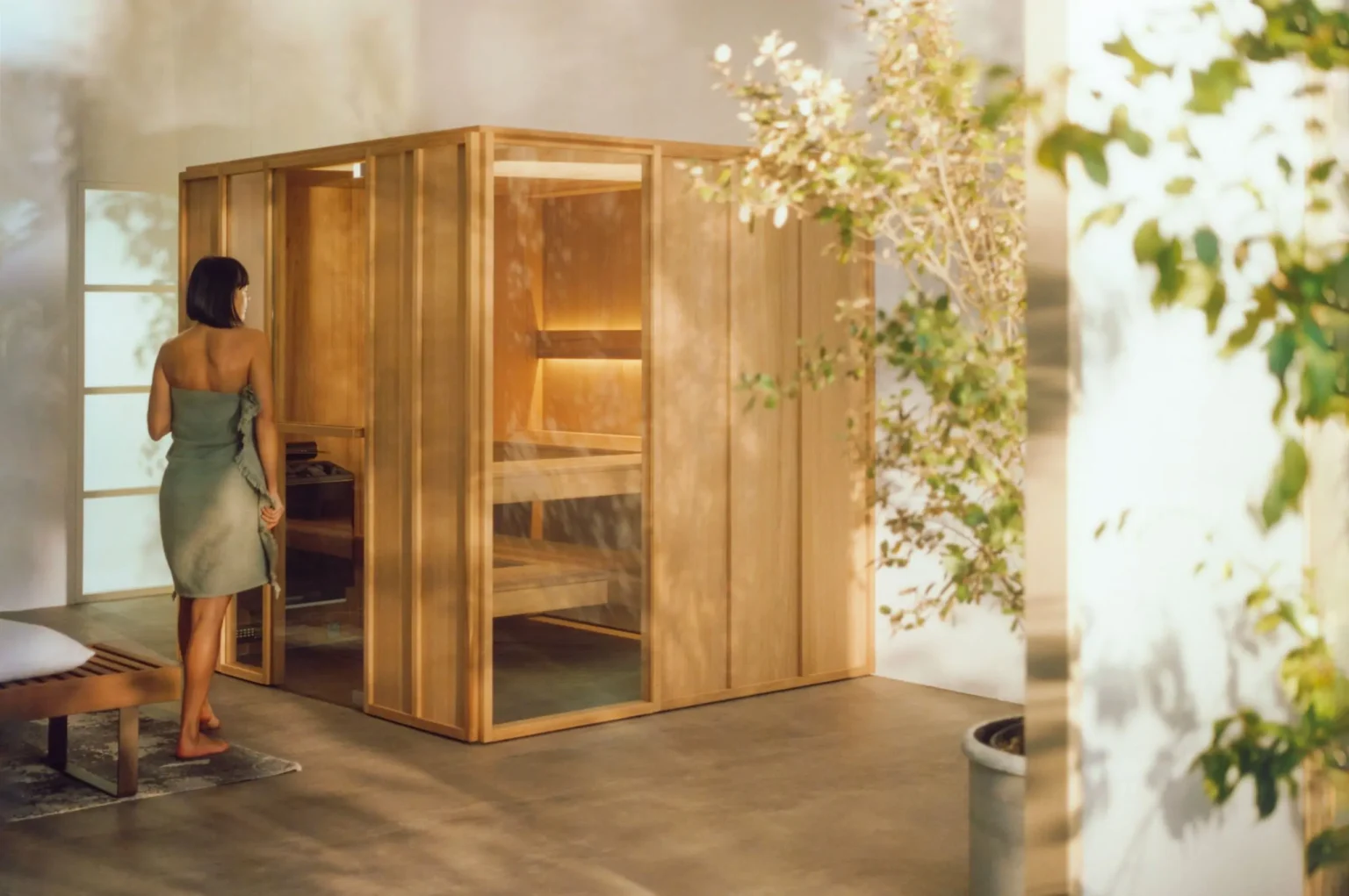 EFFE Kanso sauna met houten ritmestructuur toegepast als architectonisch volume in een interieur
