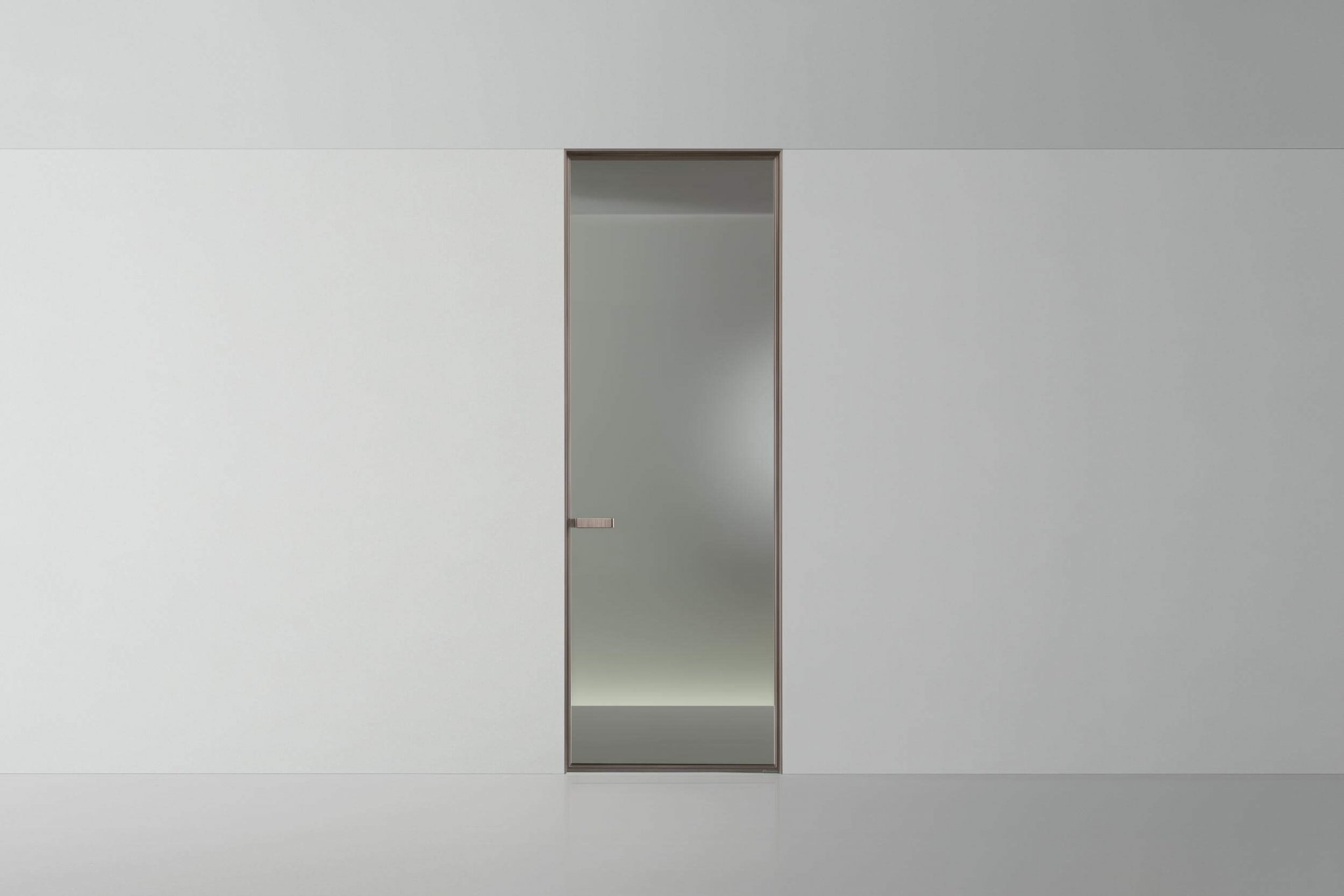 Glazen taatsdeur van Rimadesio Vela met aluminium profiel voor lichte overgangen tussen ruimtes