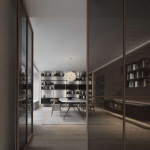 Rimadesio Air Plus glazen taatsdeur met verdiepte vlakverdeling in een luxe interieur, toegepast als transparante binnendeur met gelaagde materialiteit en open zichtlijnen